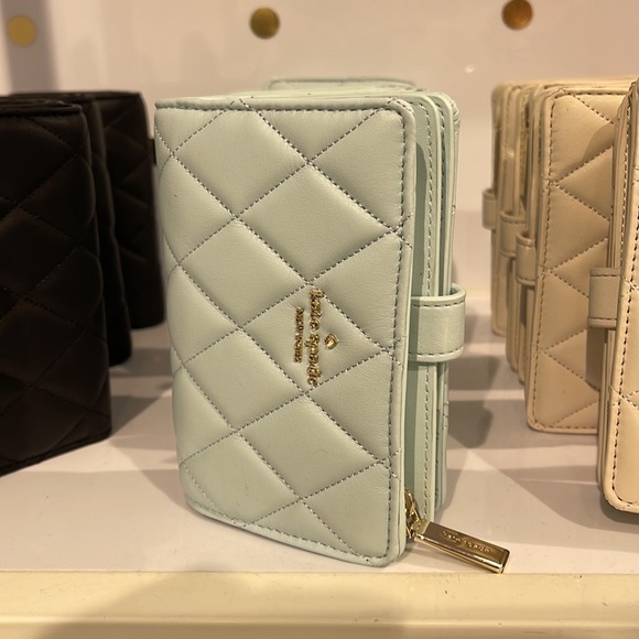 Kate Spade Carey Medium Compartment Bifold Wallet
COLOR: Turquoise - Picture 16 of 16